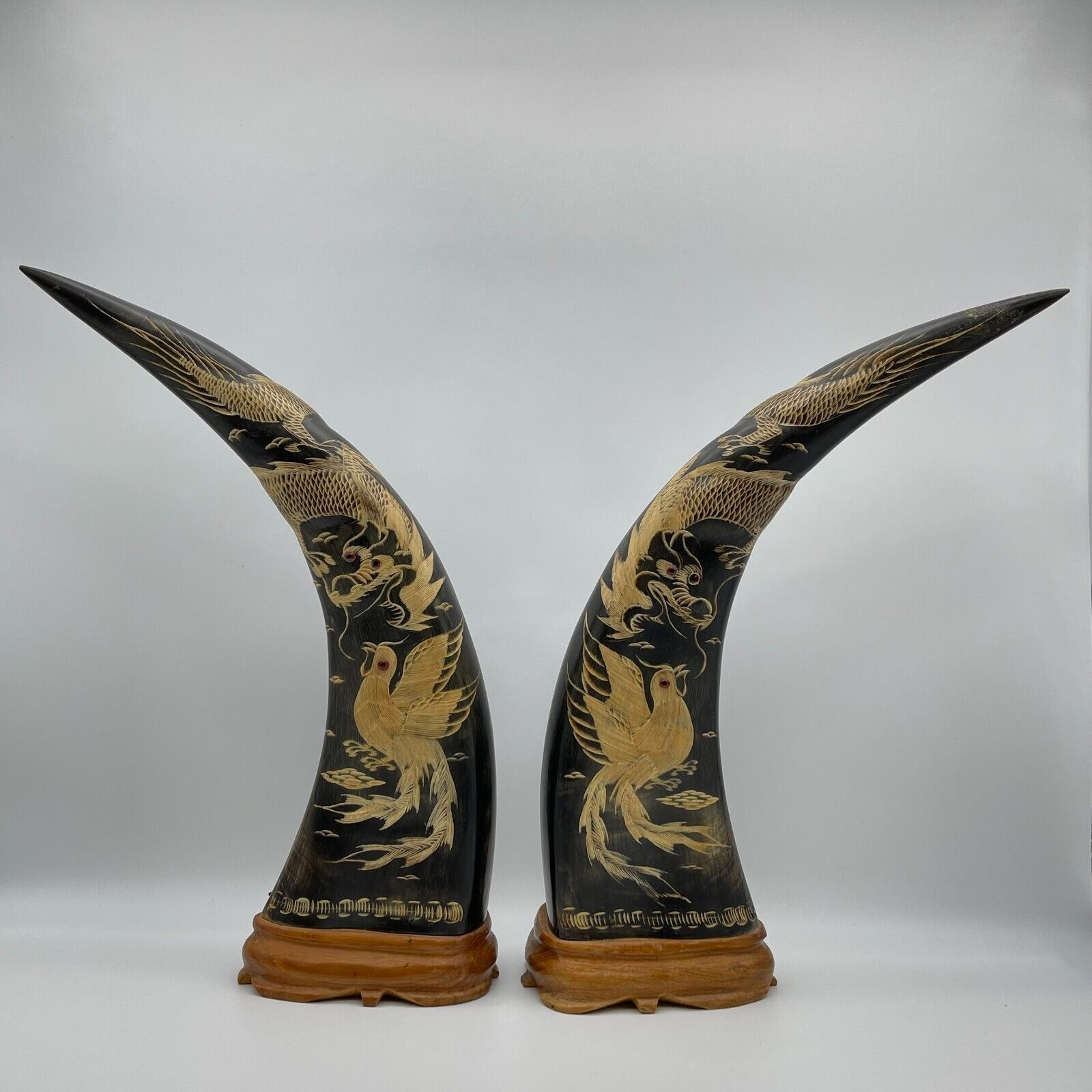 Mid Century Carved Natural Water Buffalo Horns with a Phoenix and a Dragon