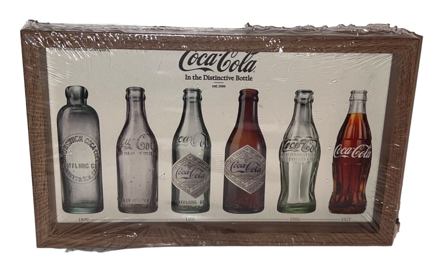 Coca Cola Wood Framed Evolution of the Bottle Picture NWT