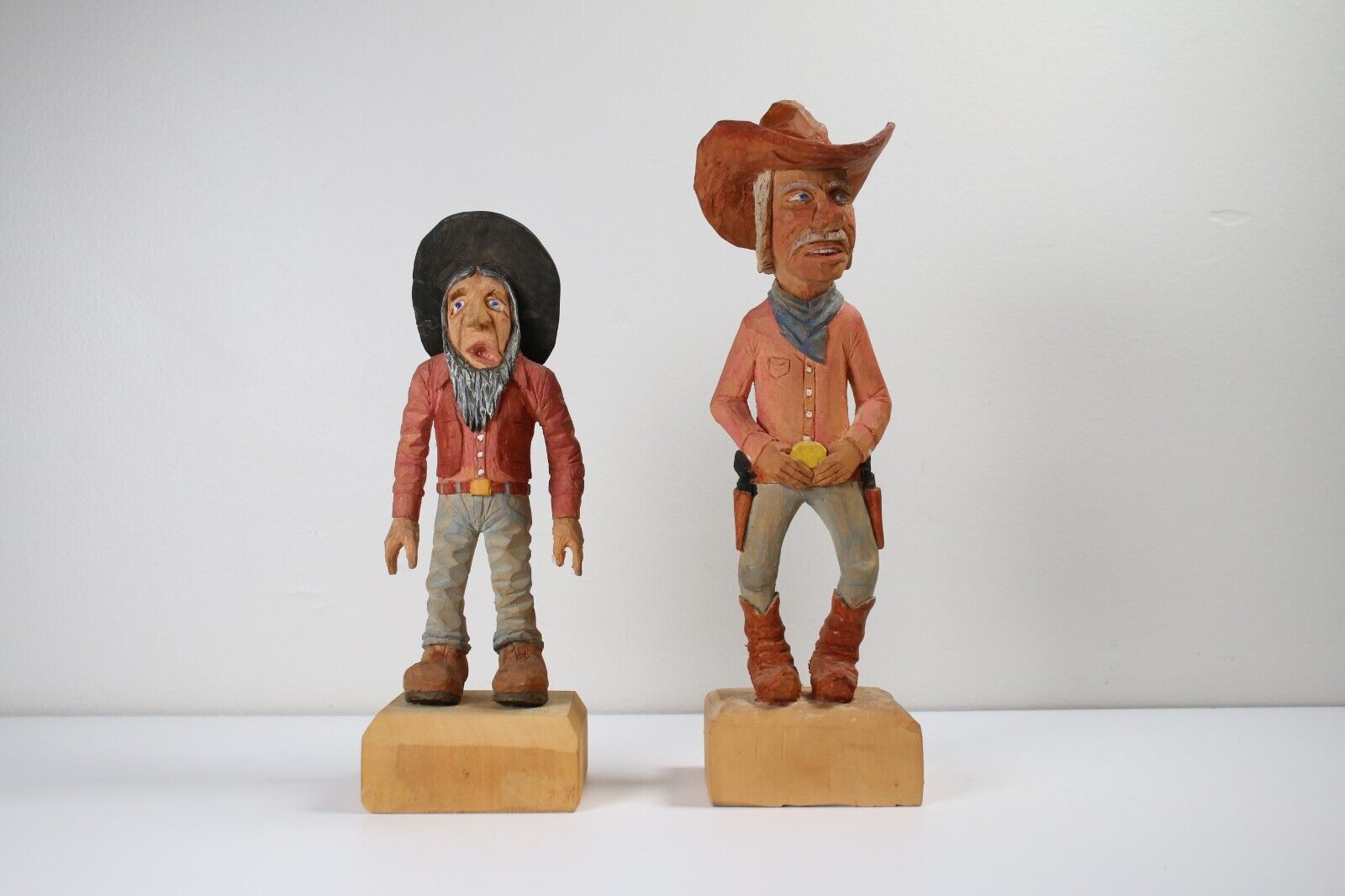Vintage Folk Art hand carved wooden cowboy figures Signed Darrell Short 89 90