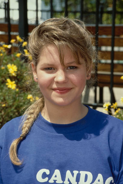 America child actress Candace Cameron wearing a blue t-shirt \'Cand- Old Photo 1
