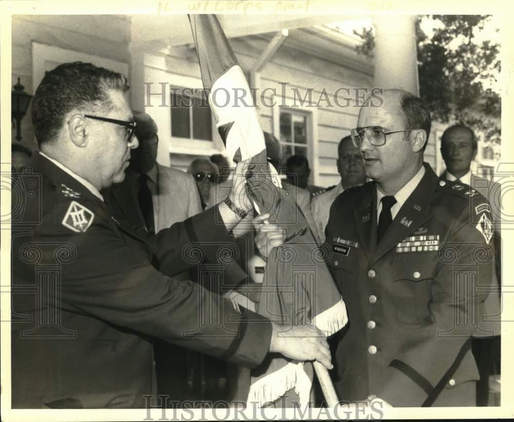 1984 Press Photo Colonel Eugene Witherspoon receives flag of command from Yore.