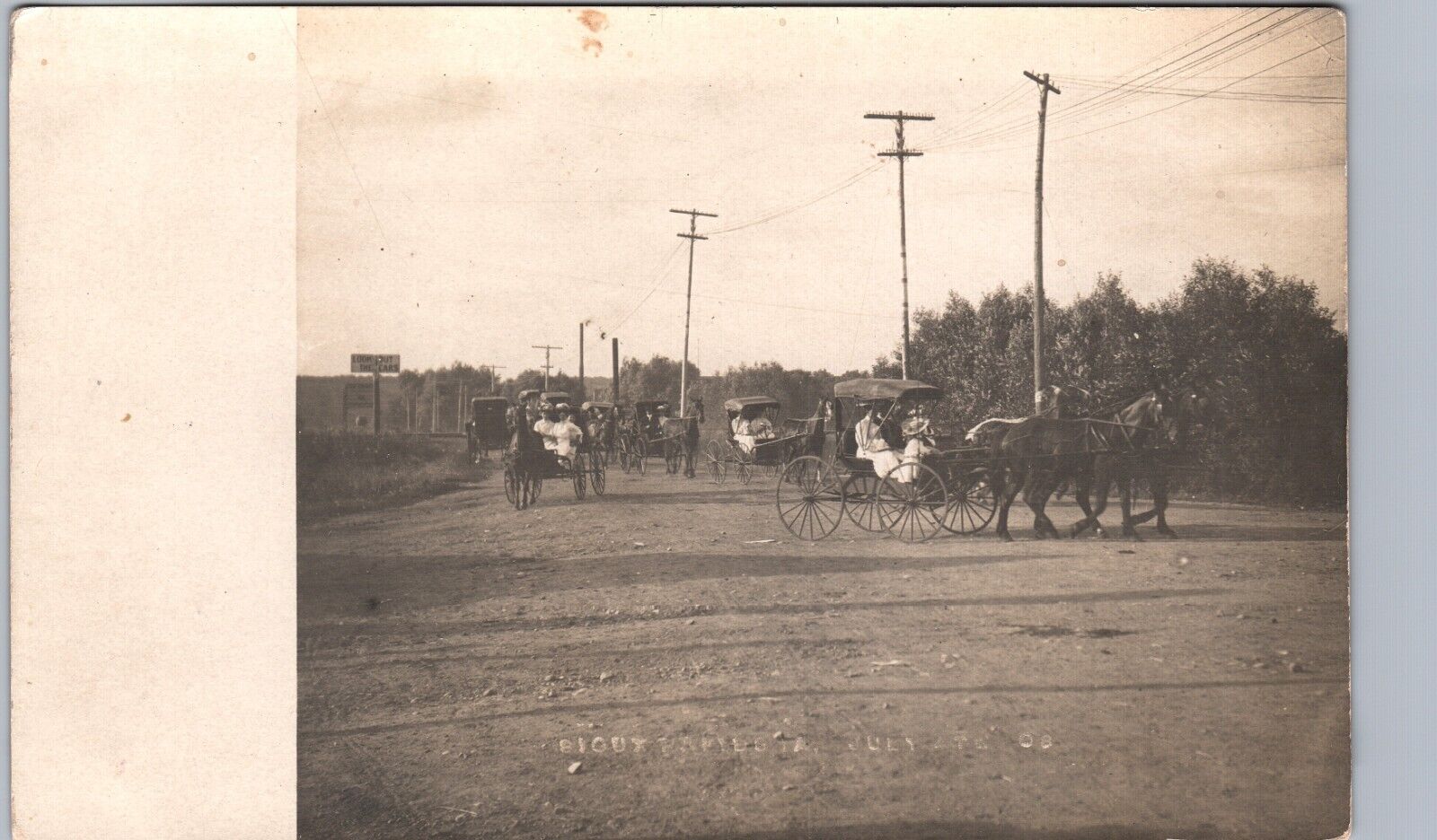 LADIES IN CARRIAGES ON ROAD sioux rapids ia real photo postcard rppc iowa horses