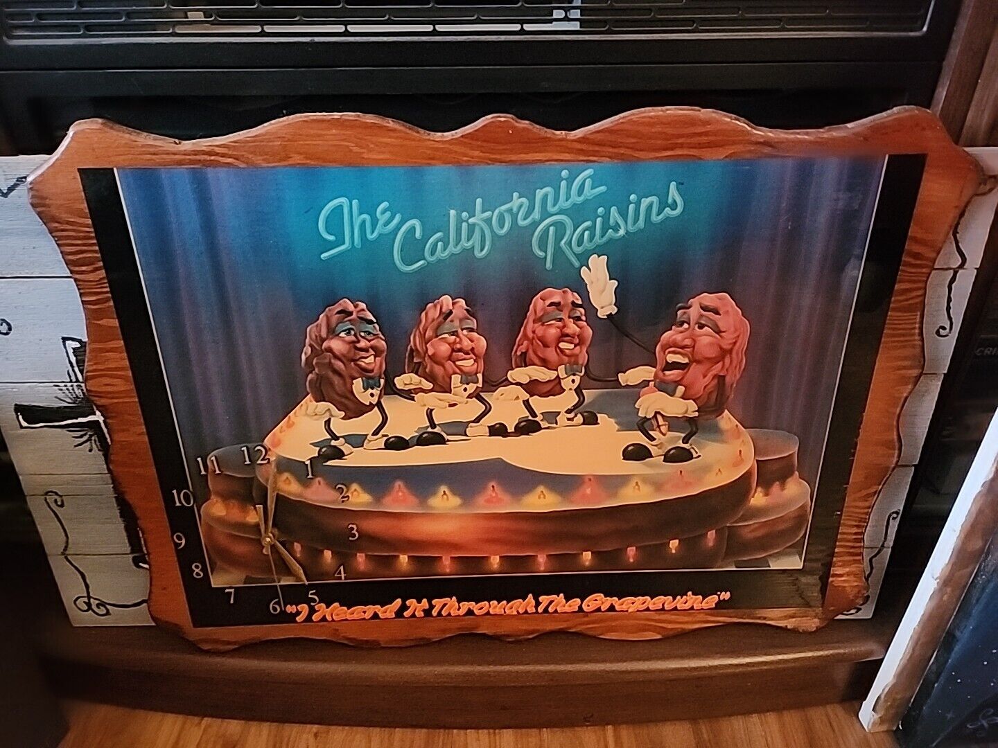 THE CALIFORNIA RAISINS 1987 VINTAGE POSTER ON WOOD WITH CLOCK NEEDS WORK 