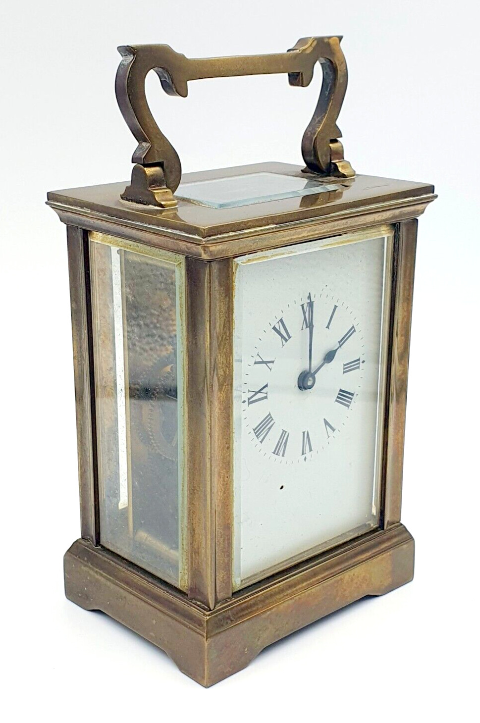 Antique Victorian brass carriage clock with glass sides and folding handle