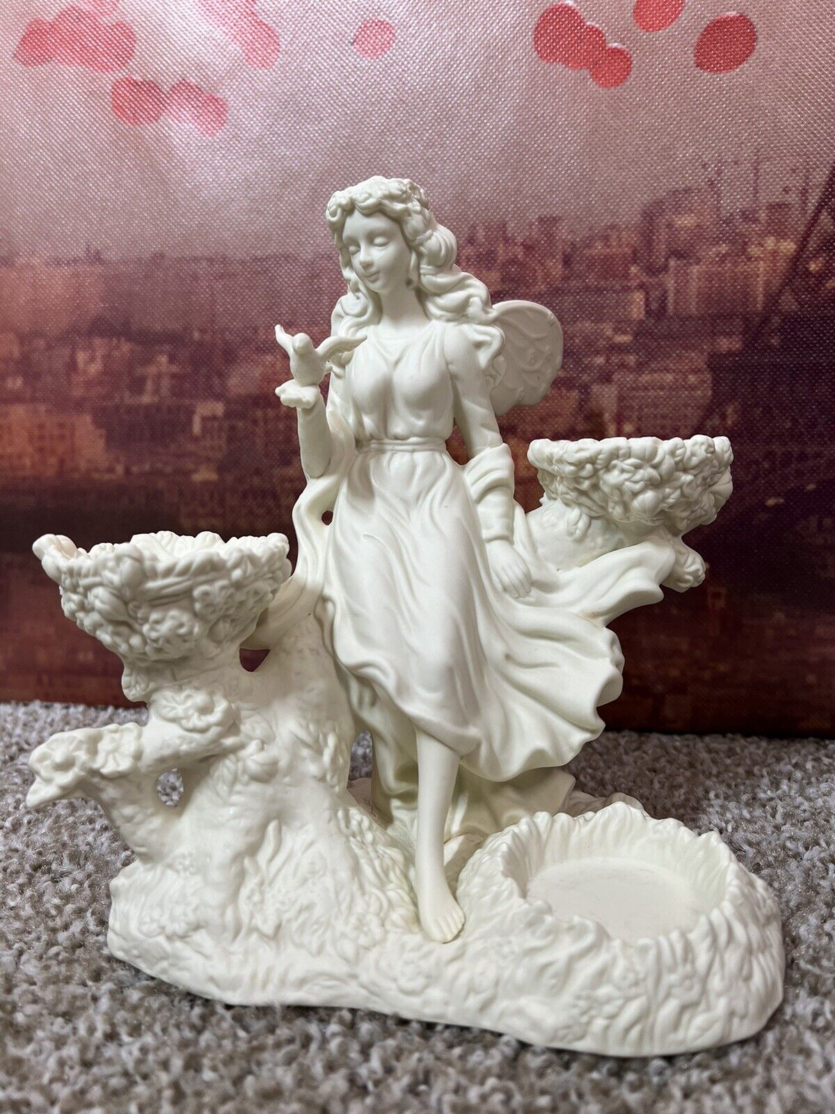 large vintage ceramic fairy with three tiered candle holders 