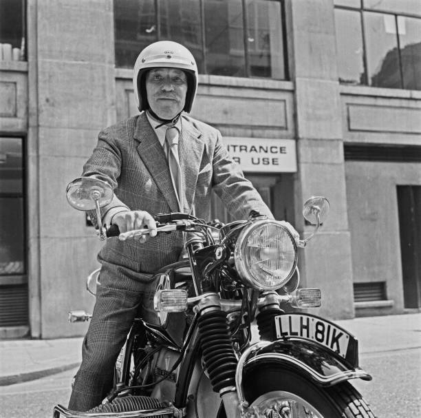 English actor Sir Ralph Richardson on his motorcycle 1974 OLD PHOTO