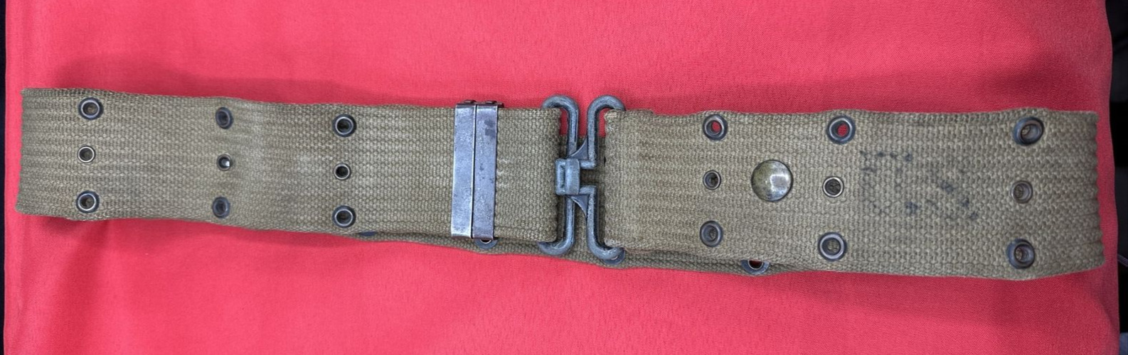 WWII/2 US M-1936 khaki US marked pistol belt used.