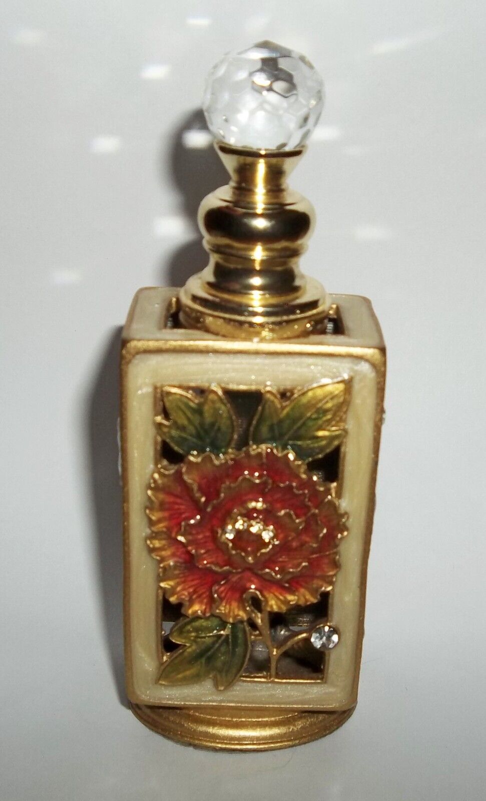 Vintage Enameled Metal Floral & rhinestone Perfume Bottle Faceted Crystal Top