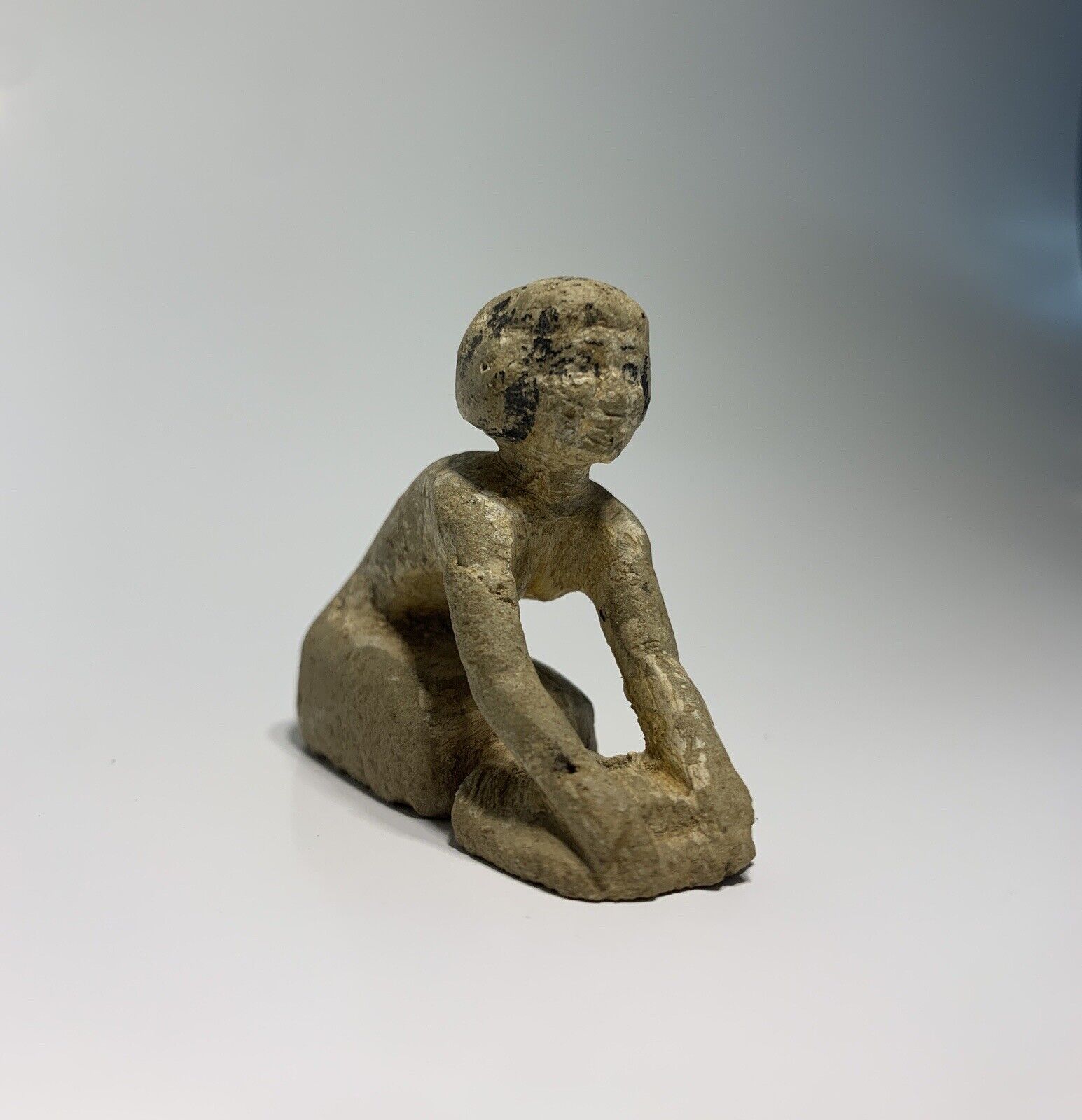 Rare Ancient Egyptian Old Kingdom stone model of a women graining. 2465-2323 BC.
