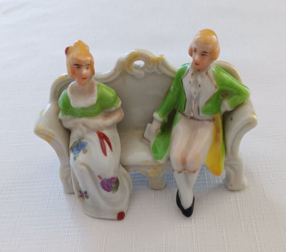 Miniature Vintage figurine of man and woman on parlor Sofa - Very good condition