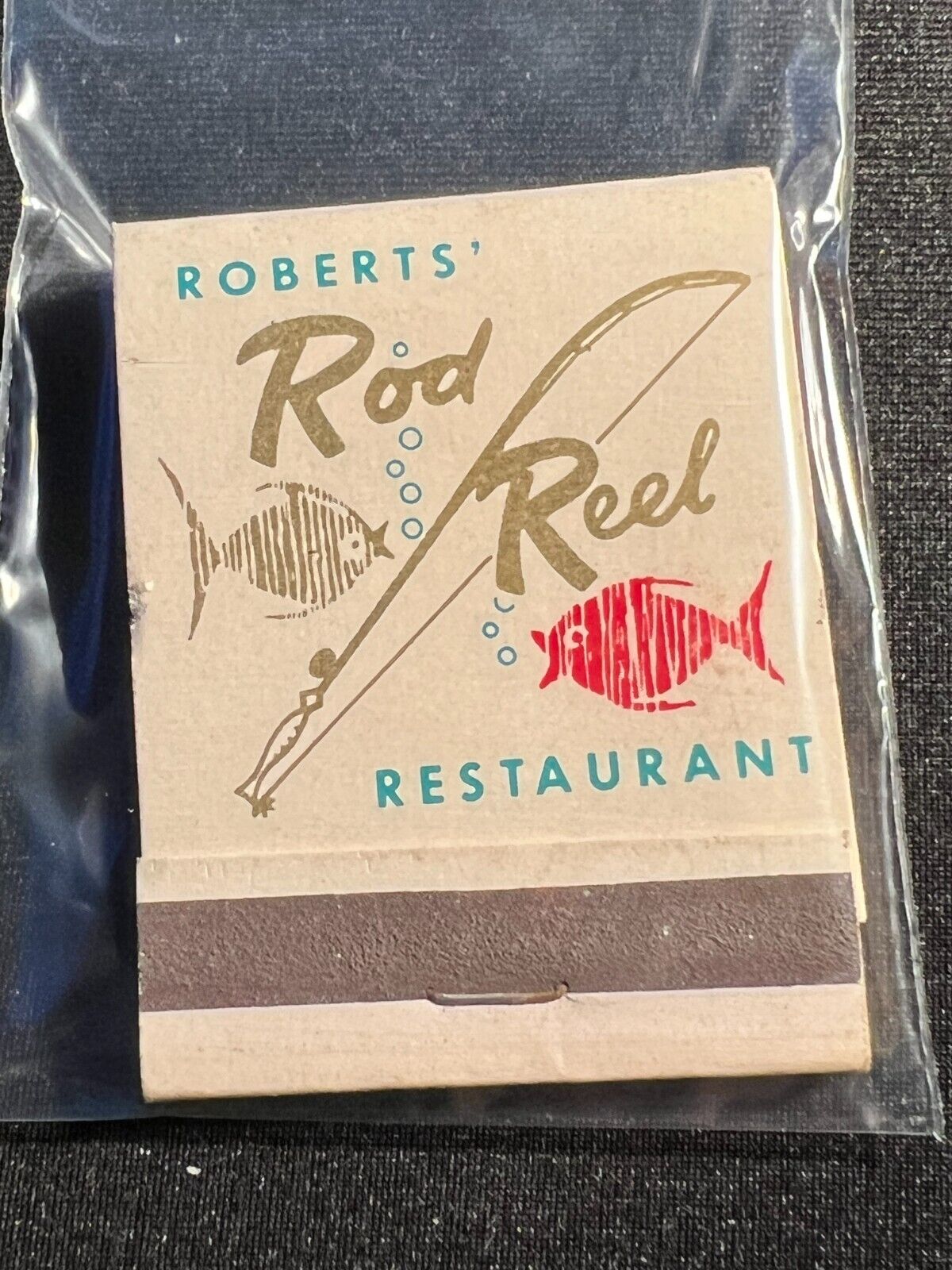 VINTAGE MATCHBOOK - ROBERT\'S ROD & REEL RESTAURANT - SEATTLE, WA - UNSTRUCK