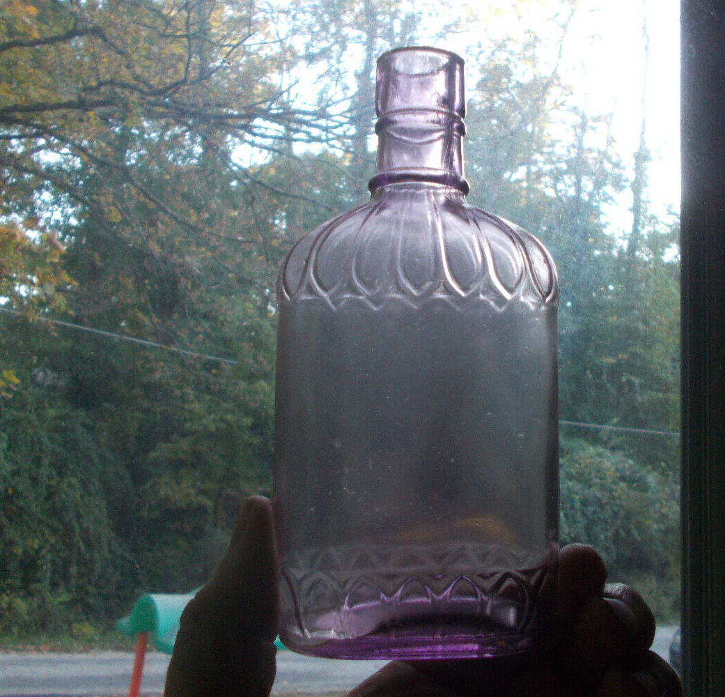 PRETTY SUN AMETHYST 1890s HALF PINT WHISKEY FLASK WITH FLUTED PANELS HAND BLOWN