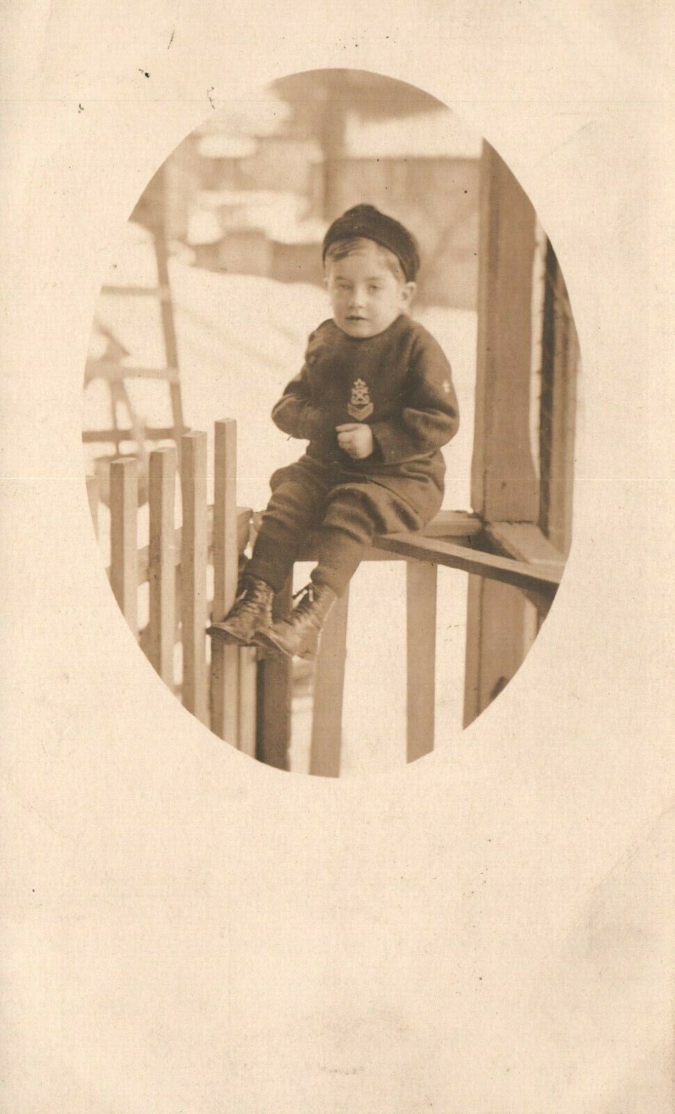 Vintage Postcard 1910\'s RPPC Young Boy Sitting on Porch Fence Portrait Photo