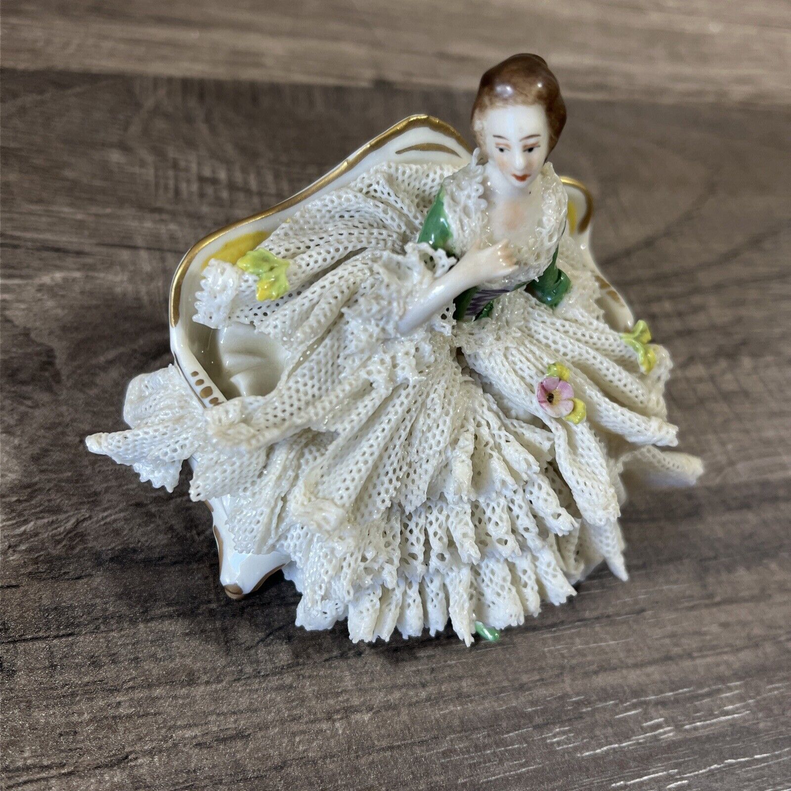 Vintage Dresden Lace Porcelain Victorian Lady sitting on Couch Figurine Germany