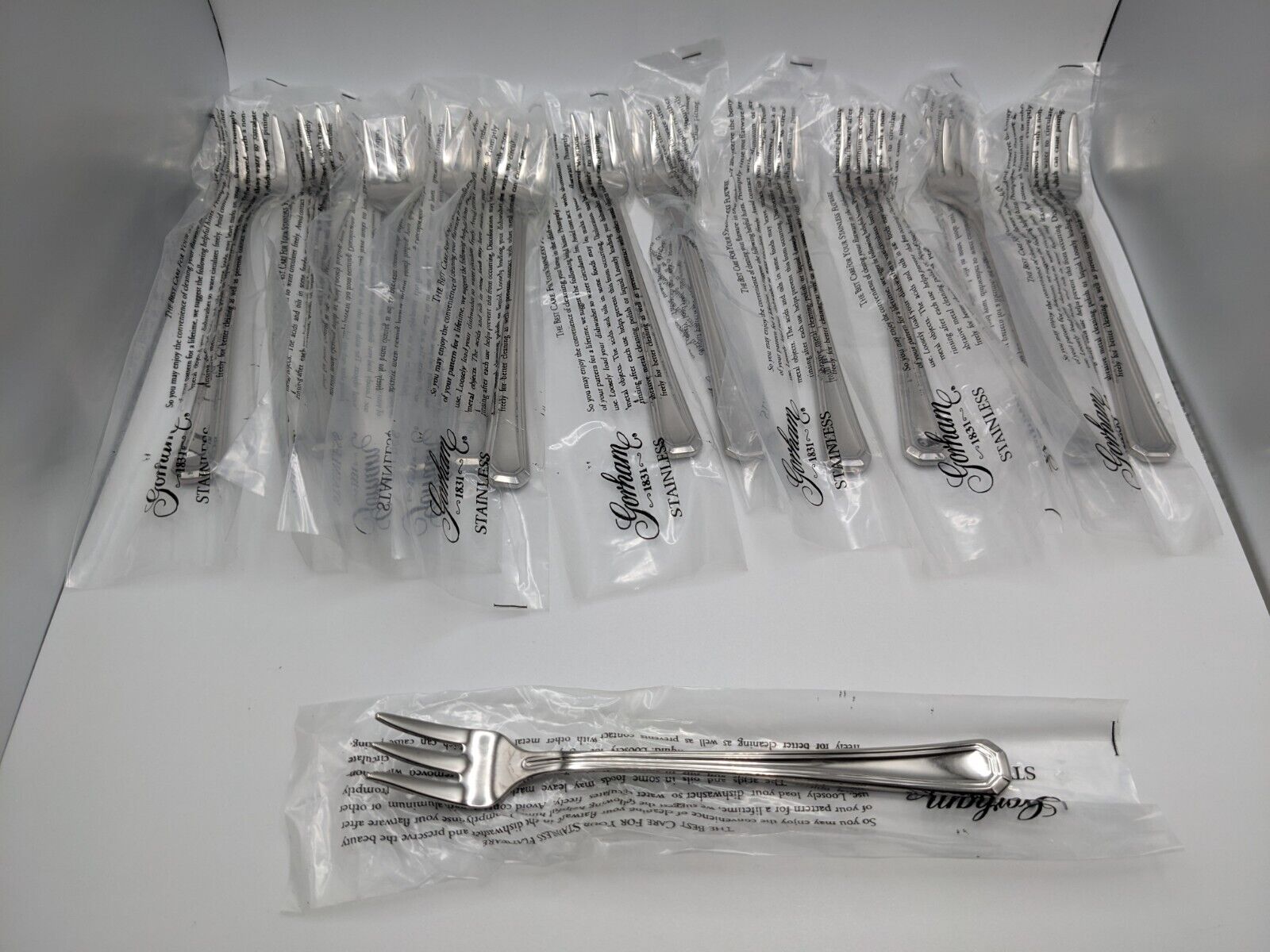 (12) New Gorham 1831 FAIRVIEW 18/8 Stainless Small Seafood Cocktail Forks Glossy