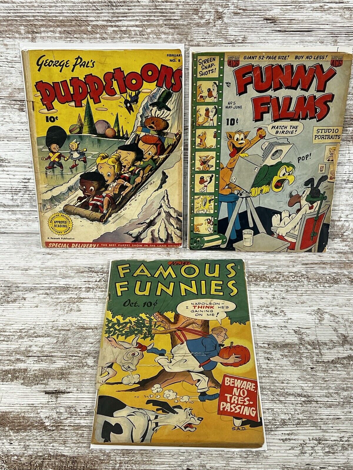 3 Golden Age comics, George Pal\'s Puppetoons 8 Funny Films 5 Famous Funnies 147