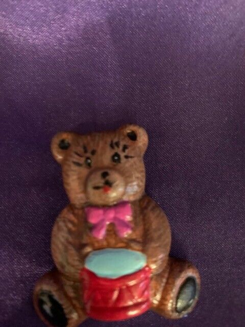 Hand painted refrig magnet ceramic bear with red drum pink bow and long lashes