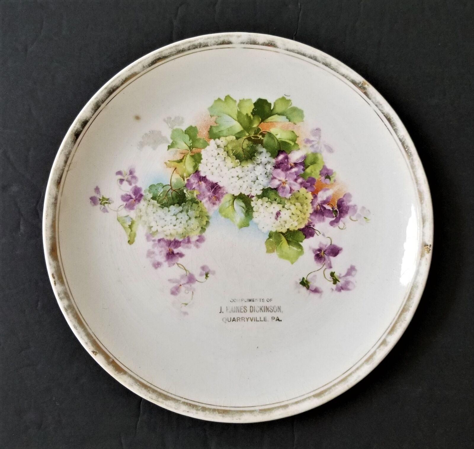 1910s antique AD PLATE quarryville pa J HAINES DICKINSON porcelain purple floral