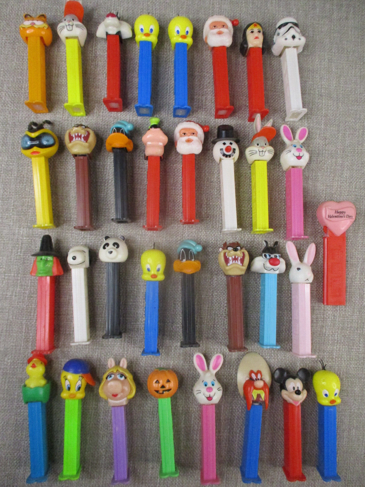 Mixed lot of 33 Pez Dispensers Unpackaged 
