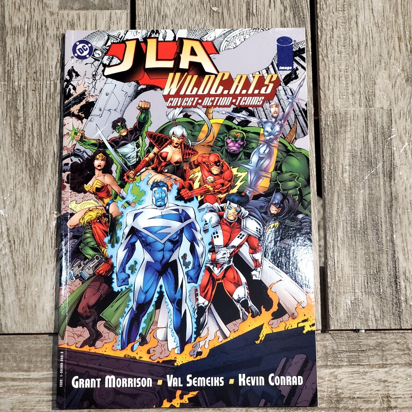 JLA/WildC.A.T.S. #1 in Near Mint + condition. DC comics.