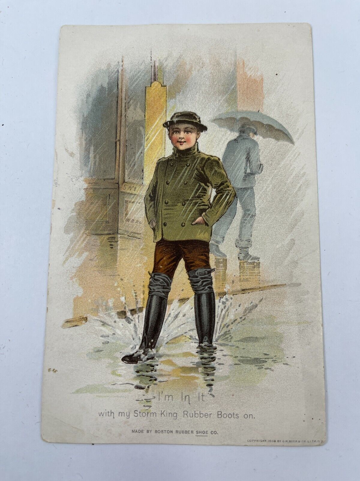 Victorian Trade Card Storm King Rubber Boots Boy and Man in Rain Urban Scene
