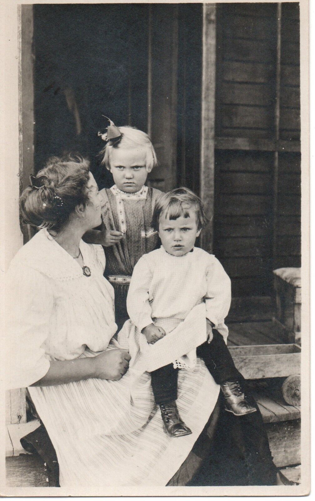 Real Photo Postcard RPPC Mother with Kids, Clear Pendant with woman c.1910