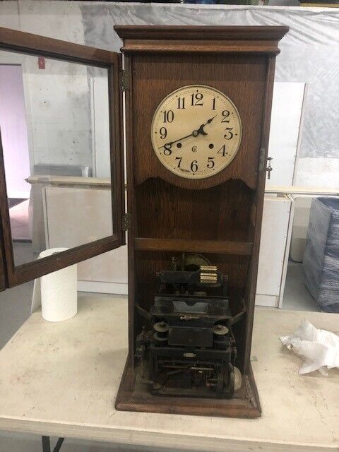 Antique Time Punch Clock- good condition, works, and has time punch cards