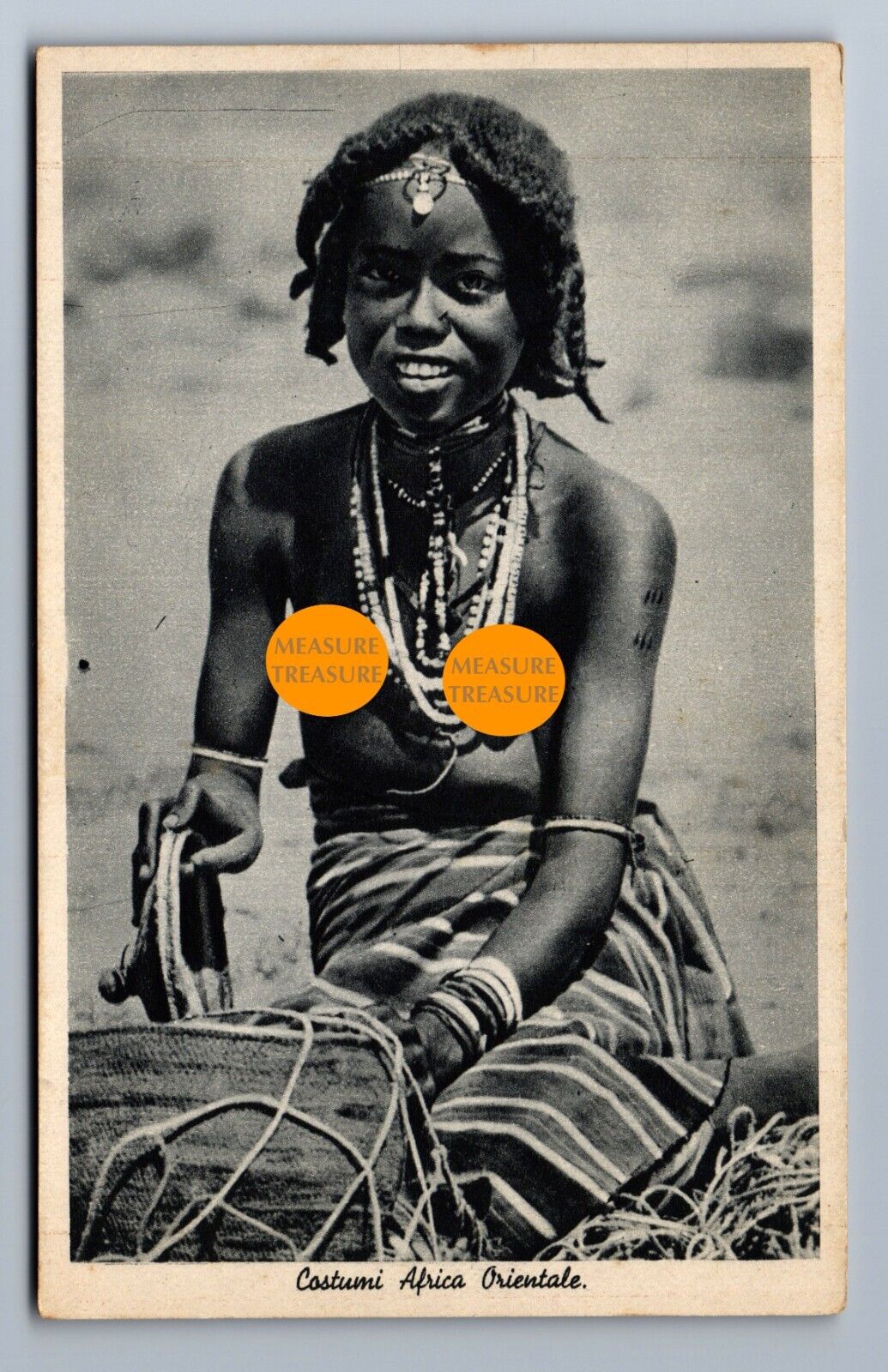 C.1940 GIRL SITTING SMILING, ERITREA ITALIAN EAST AFRICA Postcard P28