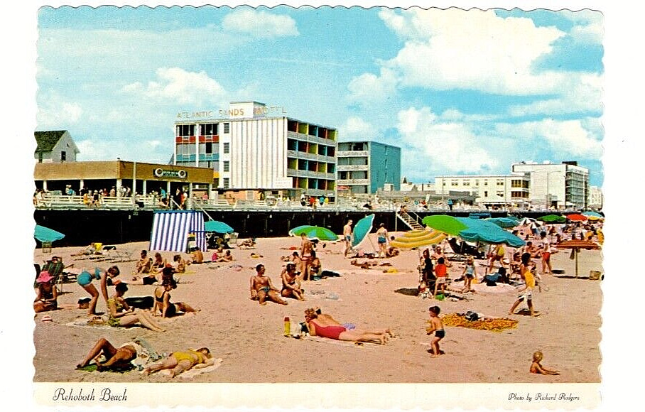 1970's/80's Deckle Edge Postcard. Playing on the Beach at Rehoboth (Delaware).