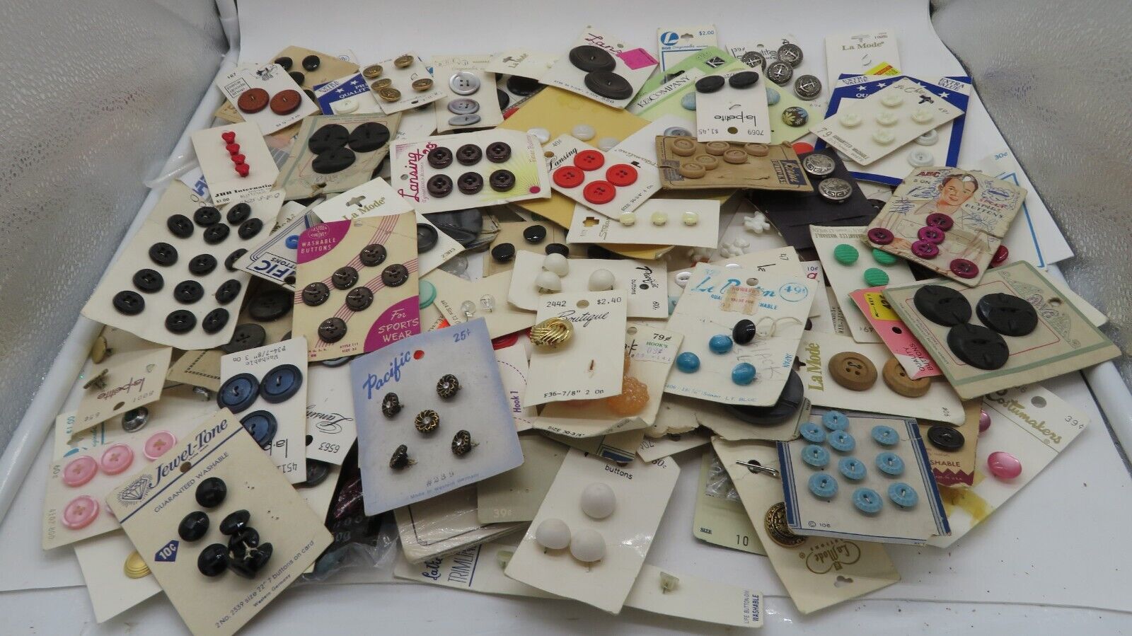 Huge lot of vintage buttons on cards full and partial