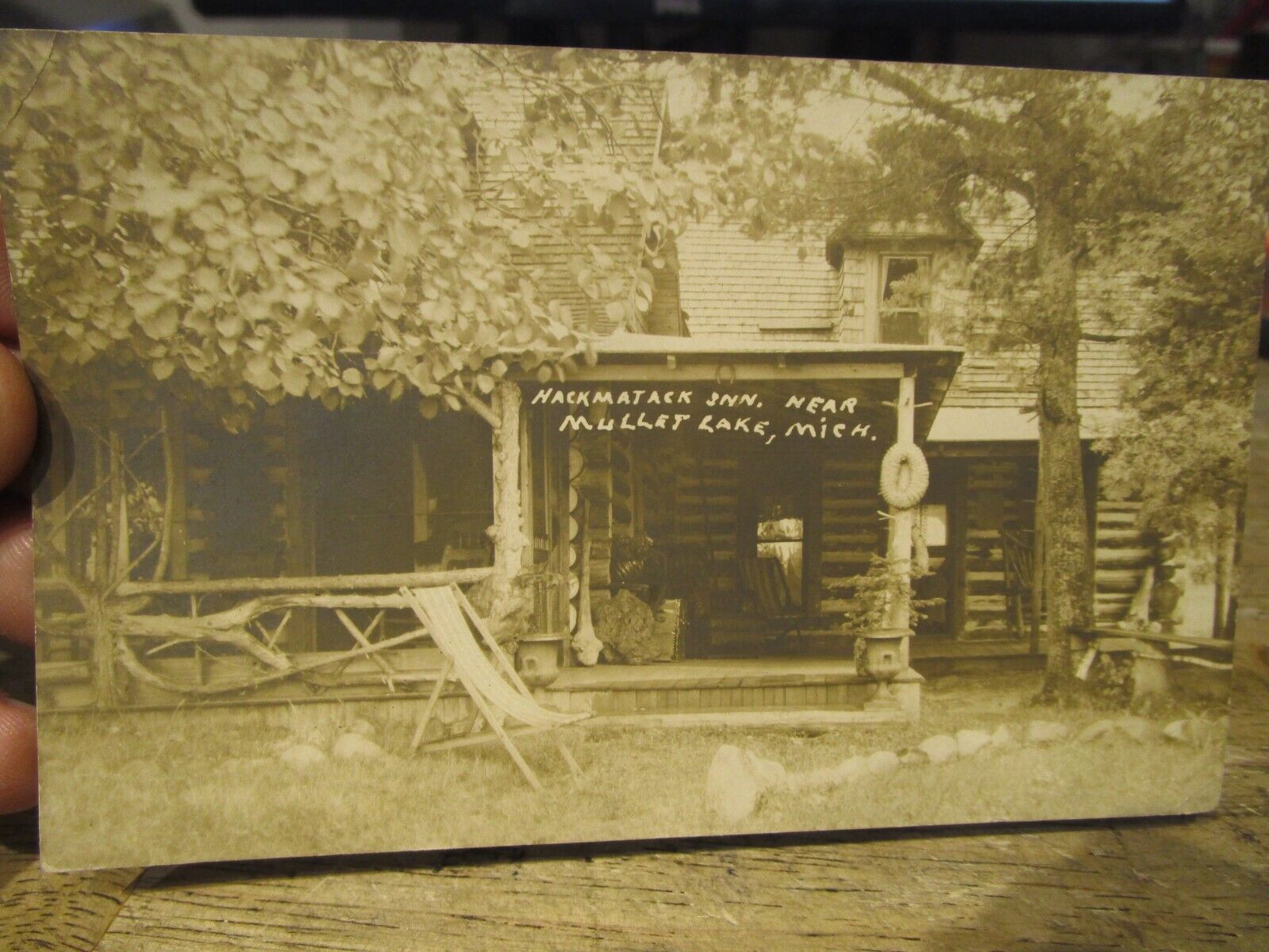 S2 Old Postcard MICHIGAN Hackmatack Inn Mullet Lake Real Photo Log Cabin Lodge