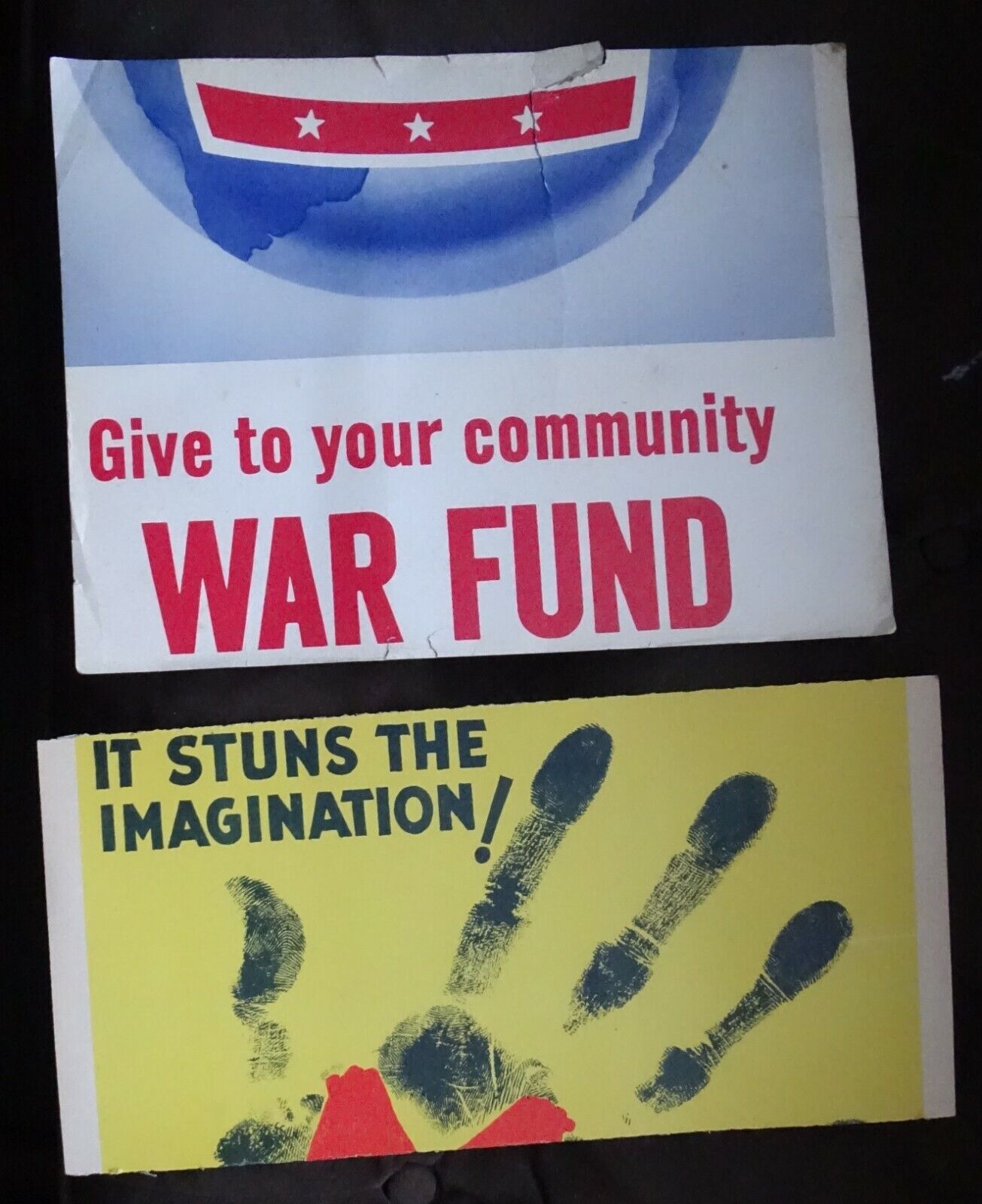Parts of two old cardboard signs COMMUNITY WAR FUND, It Stuns The Imagination