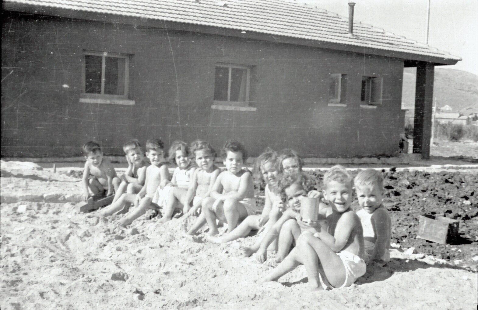 Black and White Photo 1942 Playing in the Sand  Reprint A-5