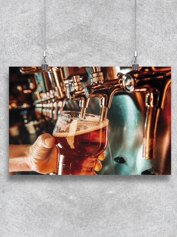 Pouring A Beer Poster -Image by Shutterstock