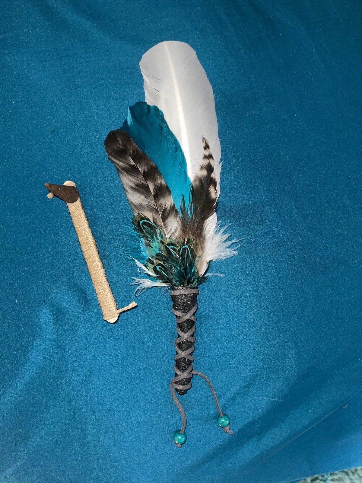 Teal Feather Smudging Wand. 12” length. Comes with Peace Incense. $1 Shipping