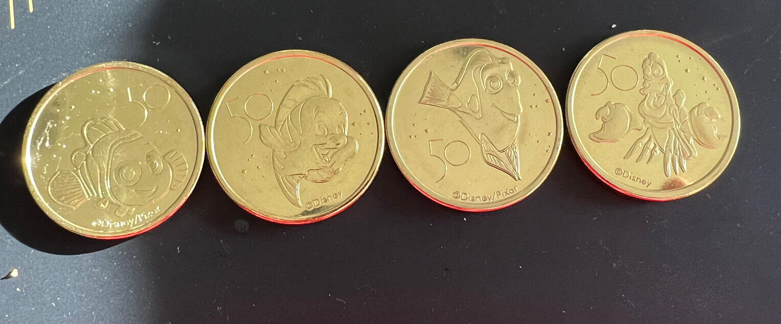 DISNEY WORLD 50th ANNIVERSARY GOLD COINS LITTLE MERMAID FINDING NEMO SET OF 4