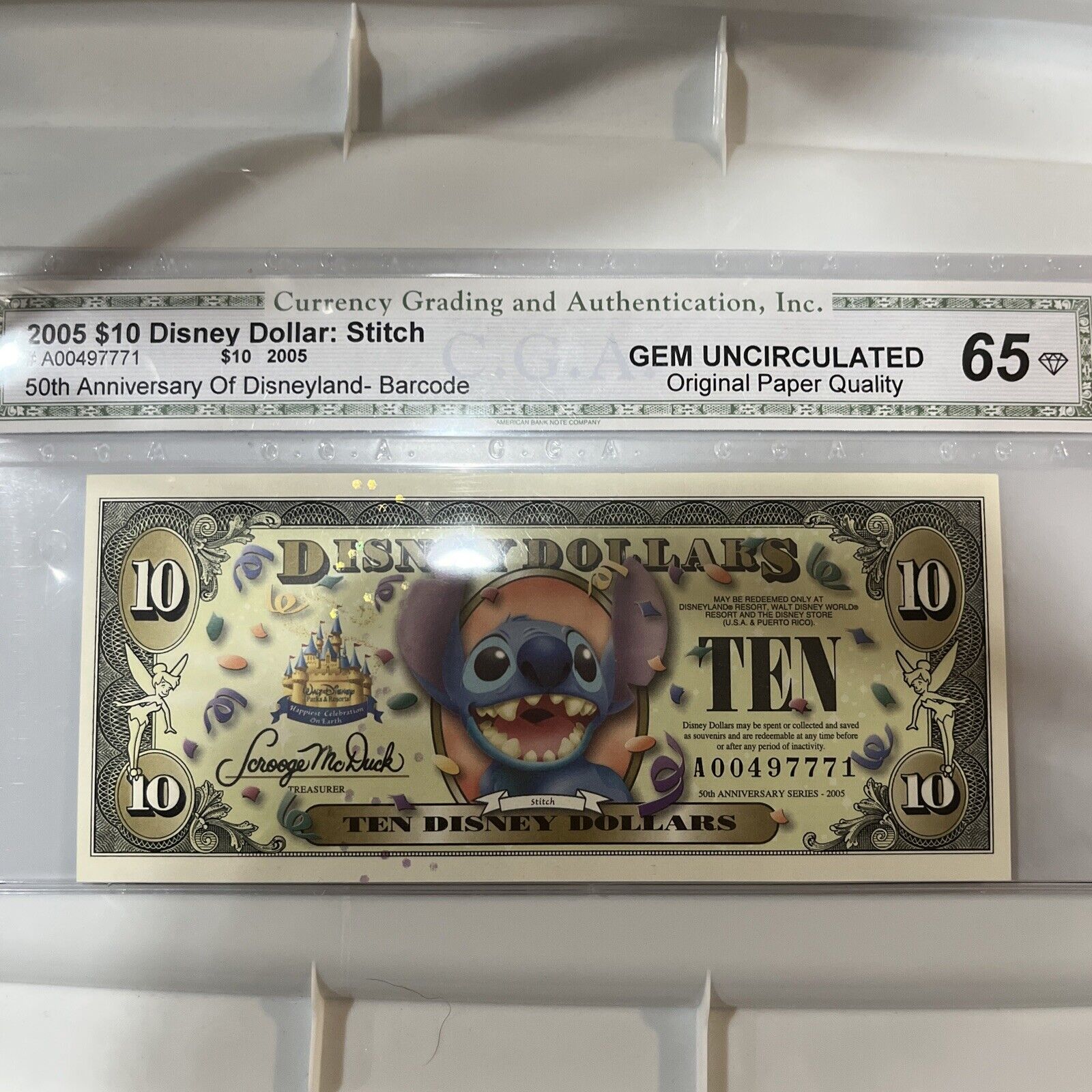 2005 $10 Disney Dollar Stitch (Bar Code) CGA Certified 65 GE/OPQ