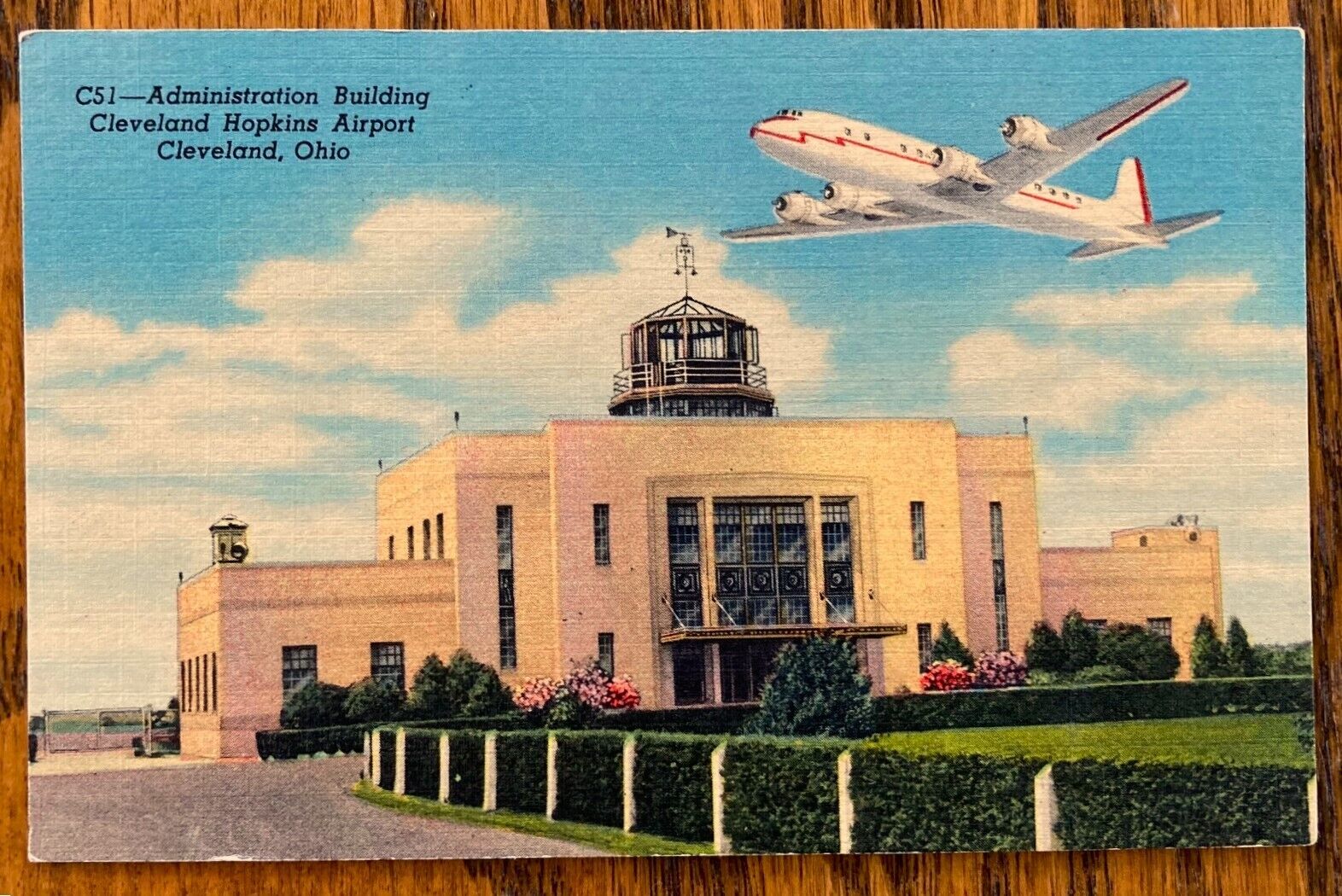 CLEVELAND, OHIO: Hopkins Airport, Administration Bldg. & Overflying DC-6 ca1951