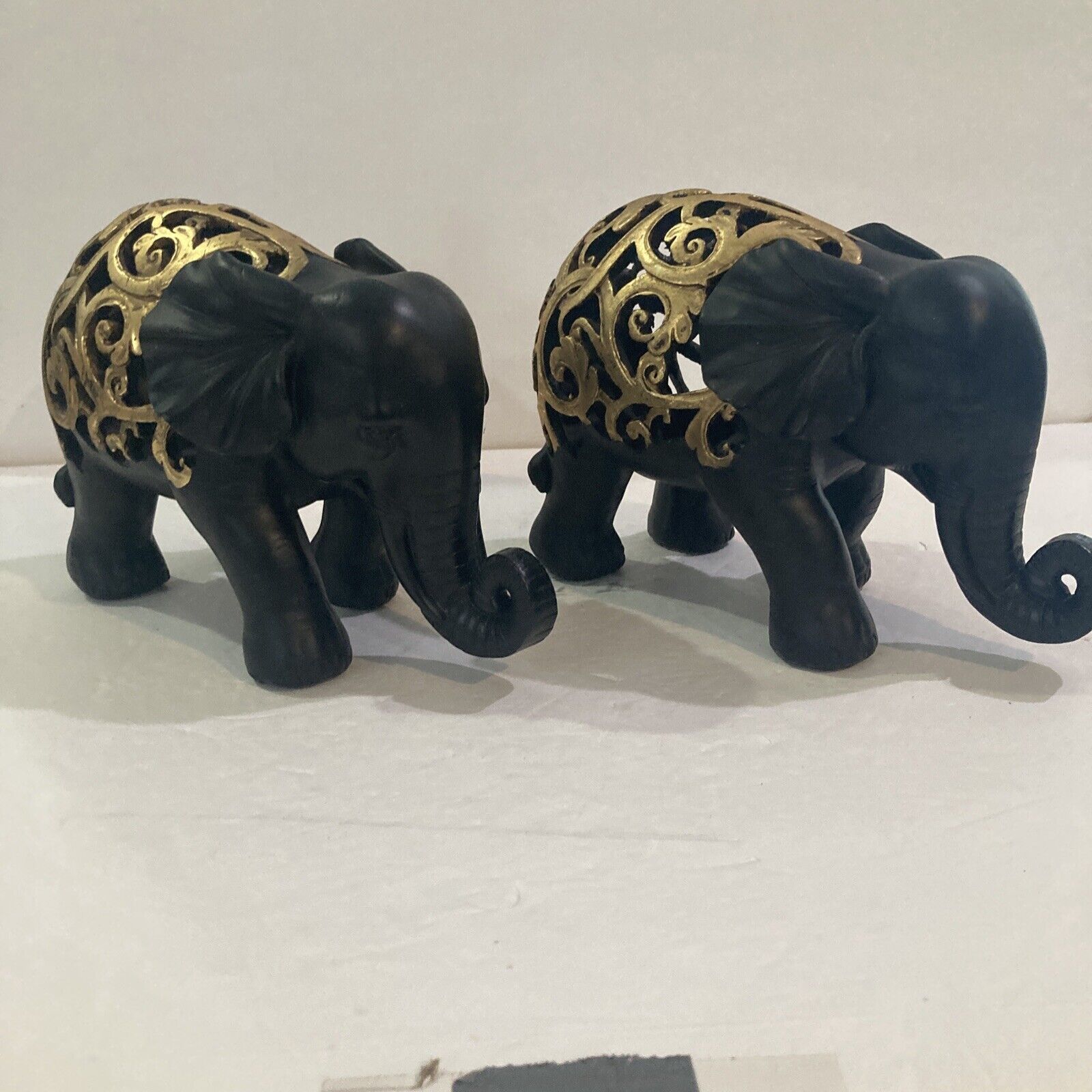 Two Elephant Table Accent Figures. 6” Tall and 10” Long.