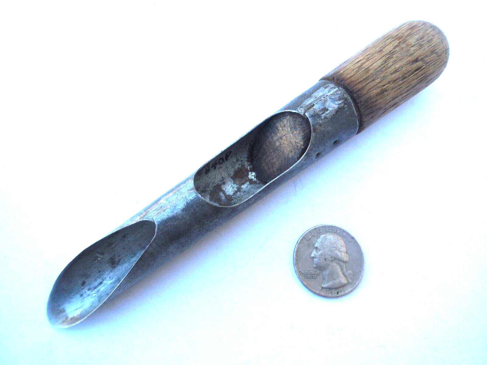 Tin apple corer with wood handle circa later 1800's