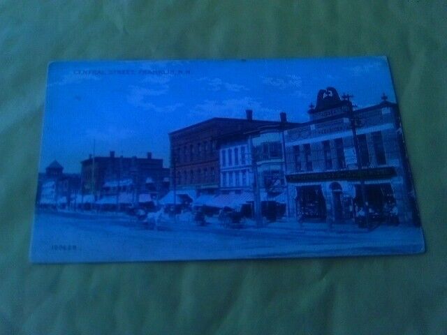 1910s POSTCARD CENTRAL STREET WOOLWORTH 5 & 10 CENT STORE FRANKLIN NEW HAMPSHIRE