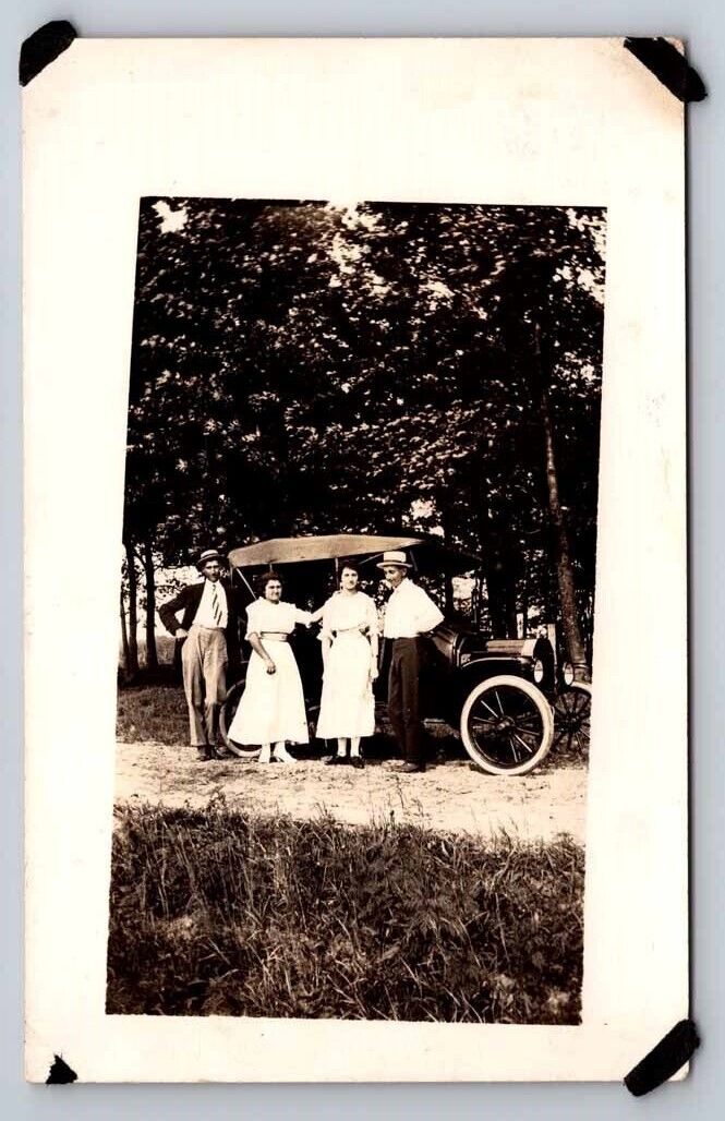 eStampsNet - RPPC Two Couples in Front of Old Car, ca 1915 Postcard 