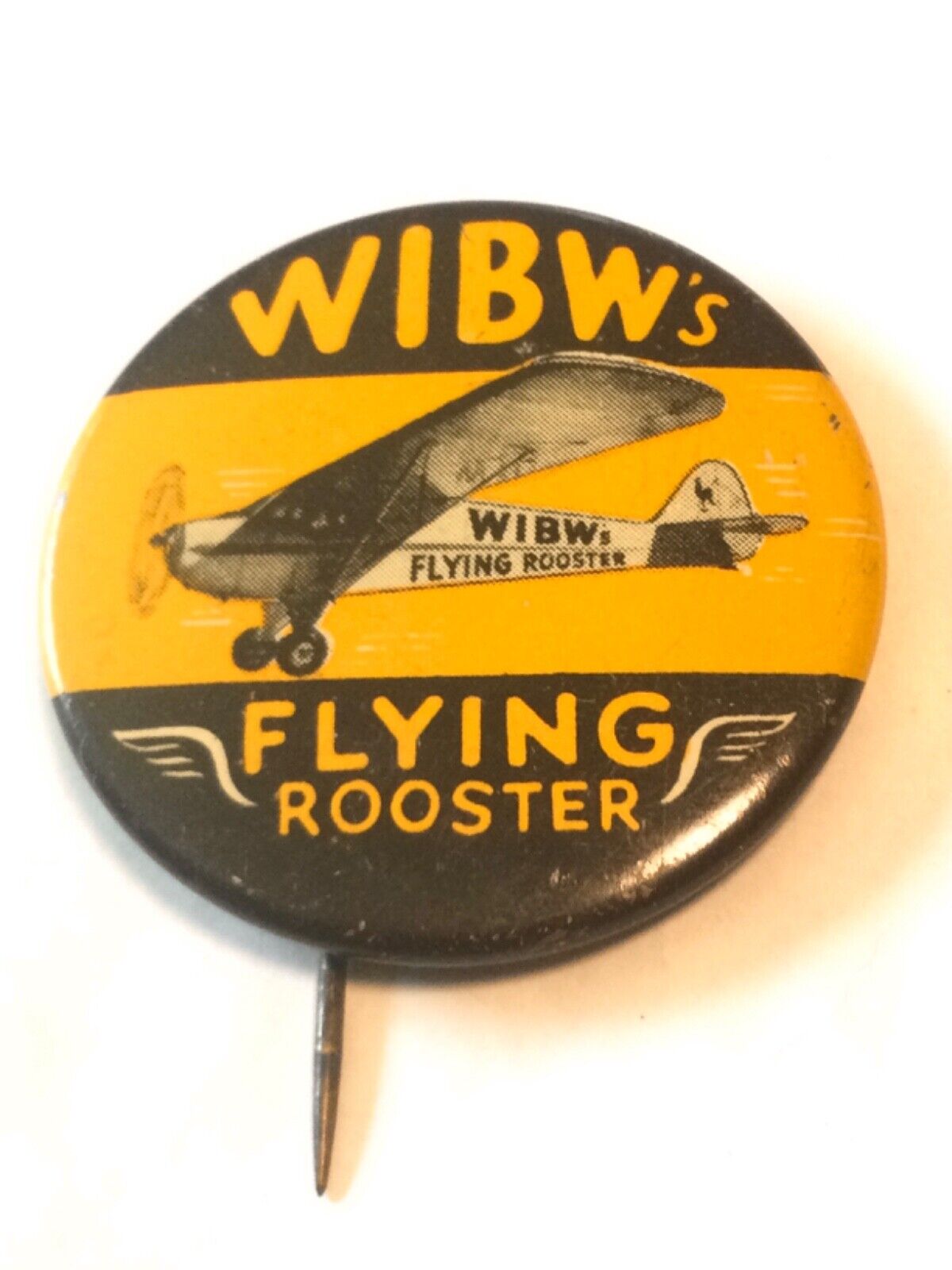 Vintage 1940’s WIBW FLYING ROOSTER AIRPLANE radio television PINBACK BUTTON