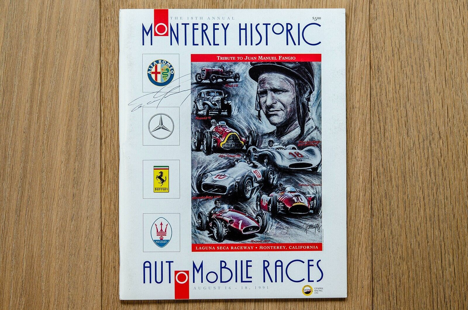Dan Gurney AUTOGRAPHED 1991 Monterey Historic Races Program – Juan Manuel Fangio
