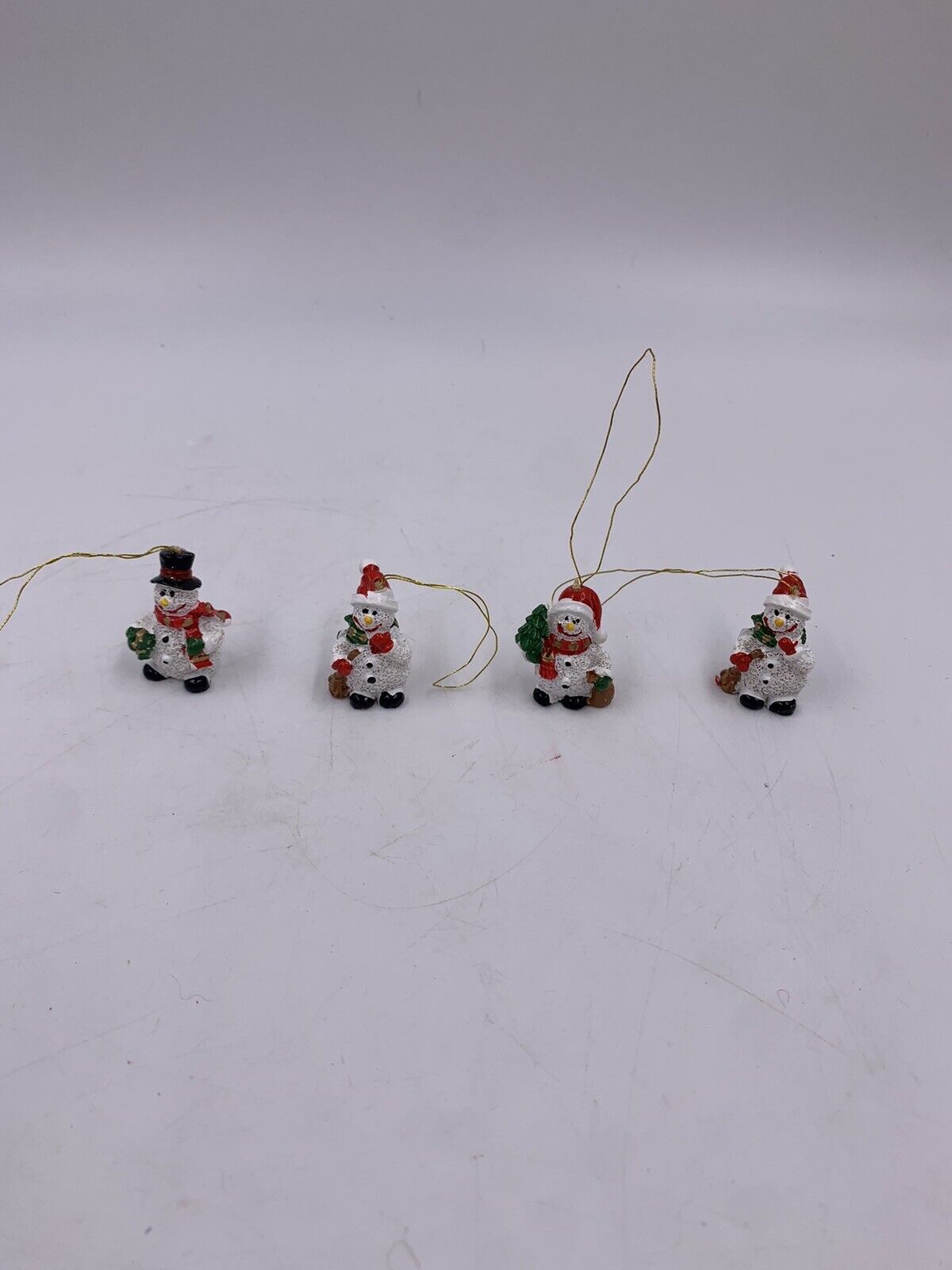 Lot of 4 Miniature Snowmen Ornaments Resin