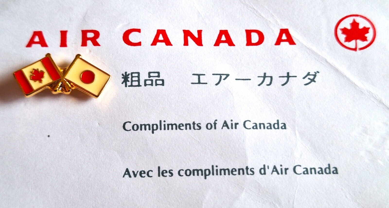 Compliments of AIR CANADA ( CANADA / JAPAN FLAGS ) PIN - 1998 Nagano Olympics