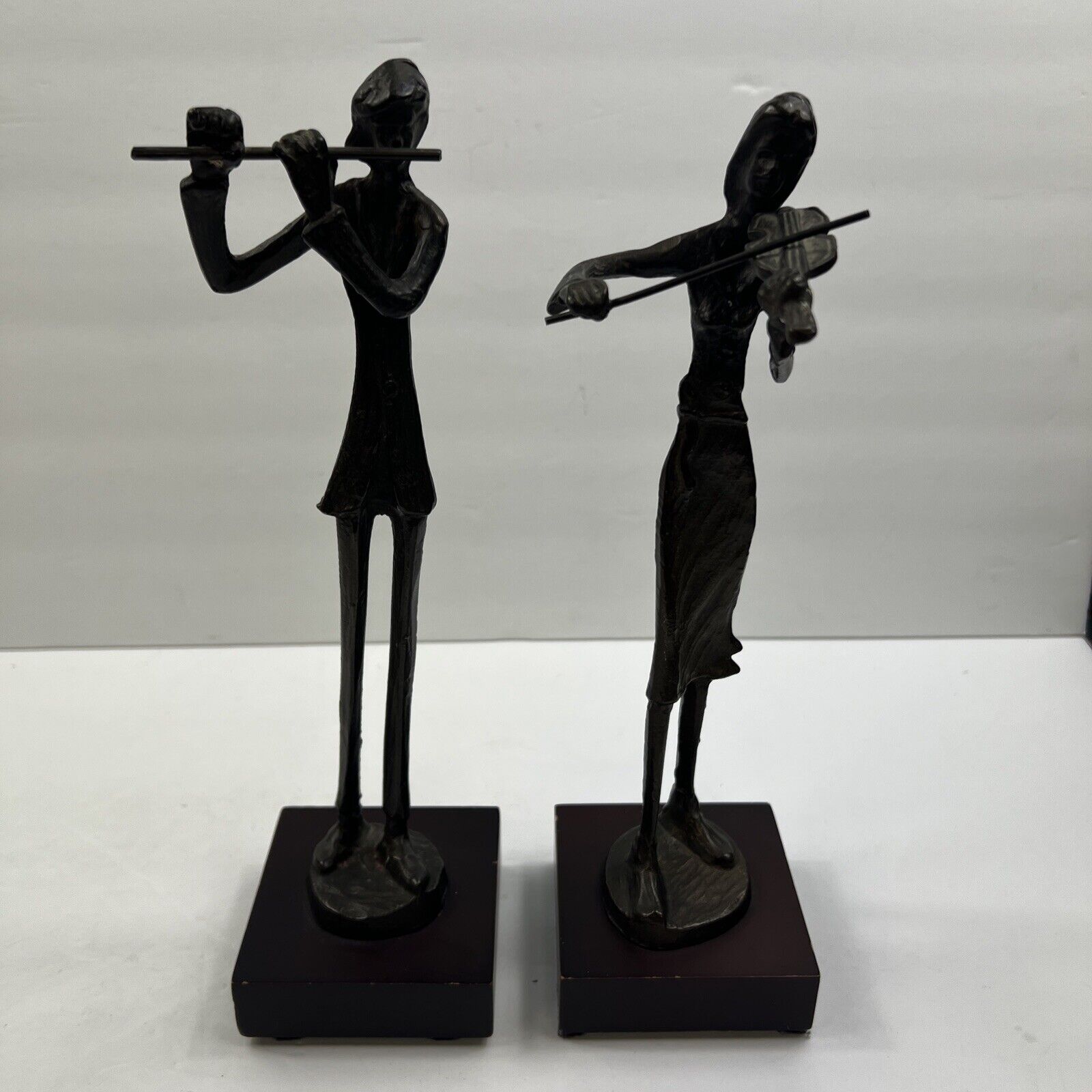 Vtg two Solid Bronze Laquered Musicians: Flutist and Violinist , 11” Tall .