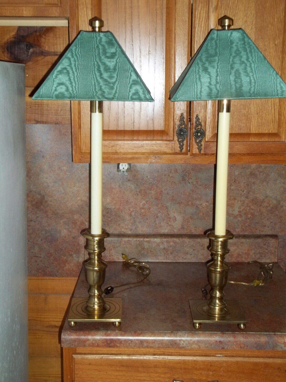 Two vintage fredrick cooper brass and flourescent candlestick lamps.