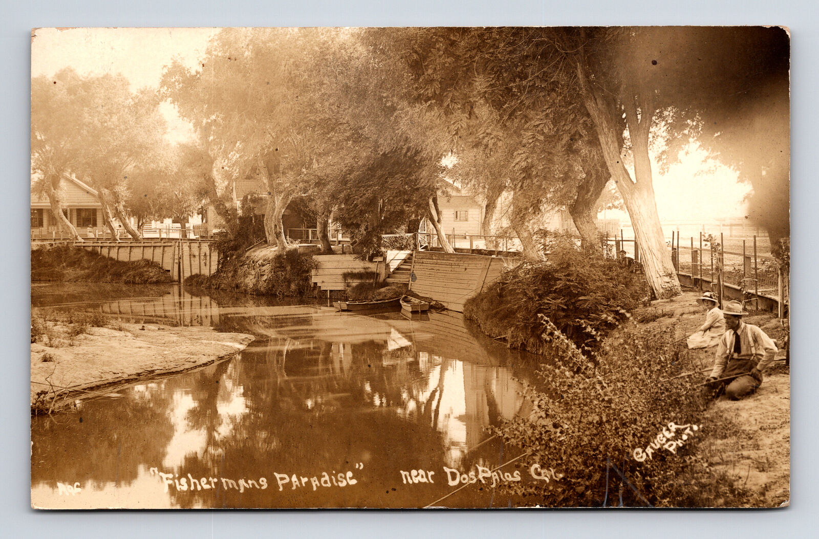 1912 RPPC Dos Palos CA Fisherman's Paradise Man Woman Cane Pole Fishing Postcard