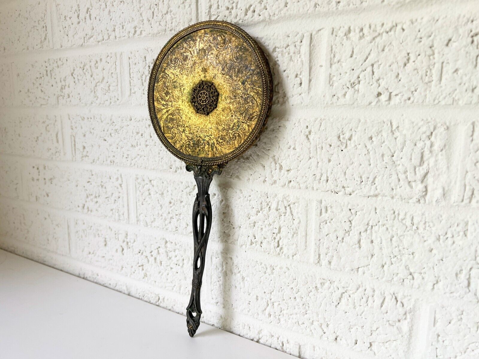 Vintage Brass Hand Mirror with Ornate Design